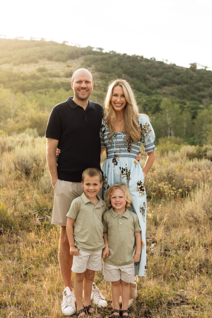 Garrett, Hannah and their two young children enjoy a beautiful summer family photo session in Park City near the Utah Olympic Training Center. Photos by Poppy & Hive Photography
